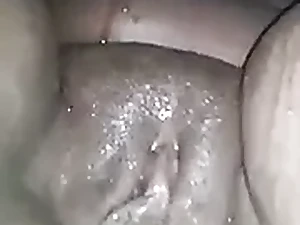 Big clit African babe gets her blacked clit sopping in the Uganda waterfall
